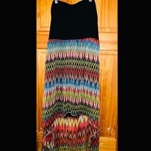 Black tube top flowing colorful bottom dress